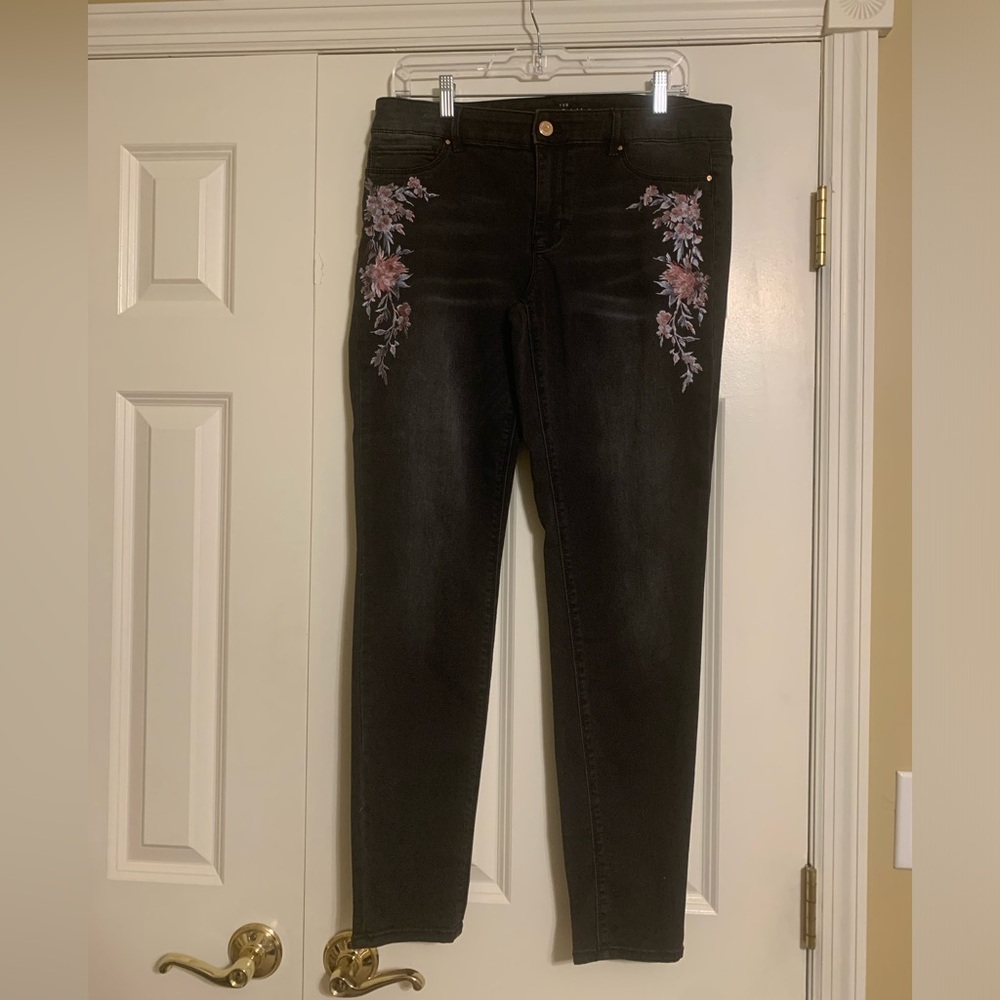 Two pairs of WHBM black denim jeans.